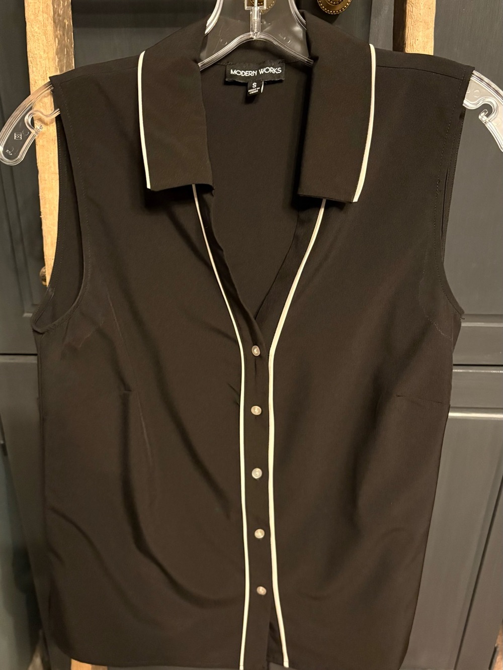 Black Sleeveless Button-Front Shirt with White Piping